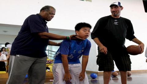 Photo Credit Attributed to Eugene Hoshiko and AP