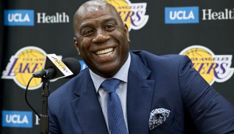 Photo by Damian Dovarganes and AP