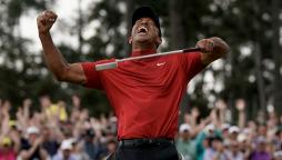 Pic of Tiger Woods by David J. Phillip  and AP