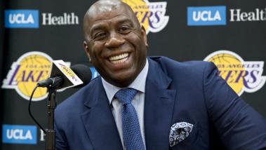 Photo by Damian Dovarganes and AP